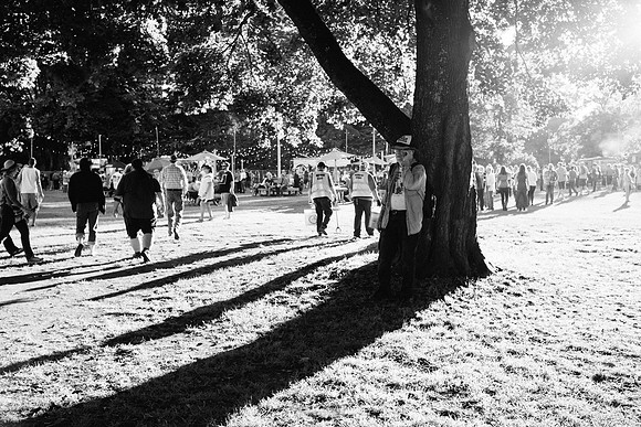 Talking on the phone in the shade at Marymoor Park. Redmond, WA.