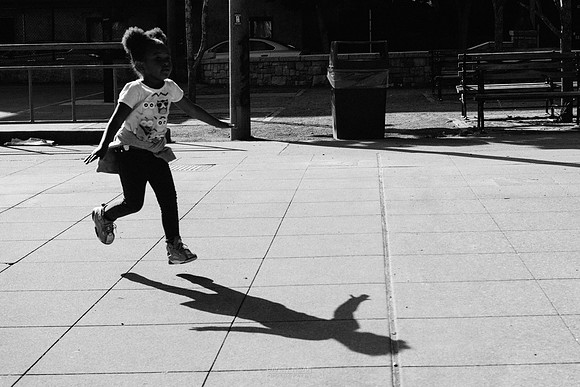 Chasing her shadow. Seattle, WA. September 2016.