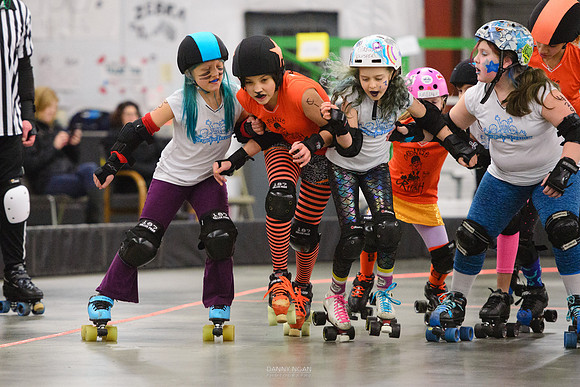 Turquoise Terrors vs. Orange Crush.