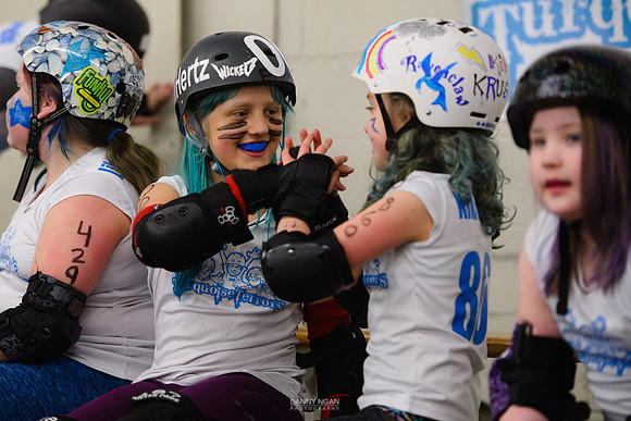 Turquoise Terrors vs. Orange Crush.