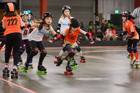 Turquoise Terrors vs. Orange Crush.