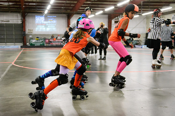 Turquoise Terrors vs. Orange Crush.
