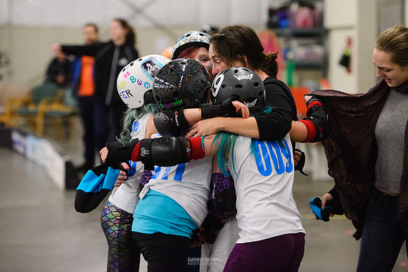 Turquoise Terrors vs. Orange Crush.