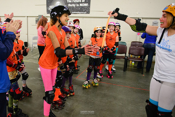 Turquoise Terrors vs. Orange Crush.