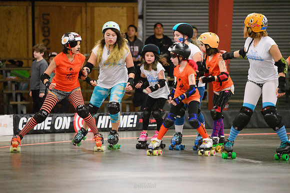 Turquoise Terrors vs. Orange Crush.