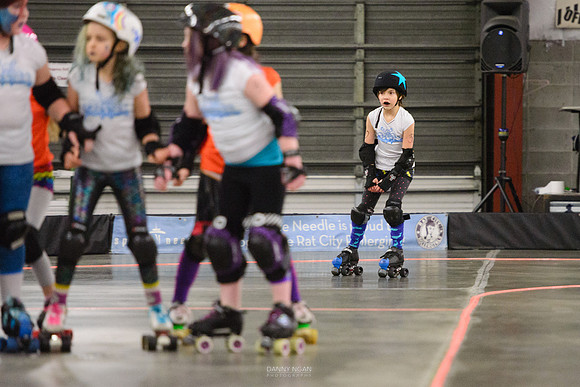 Turquoise Terrors vs. Orange Crush.