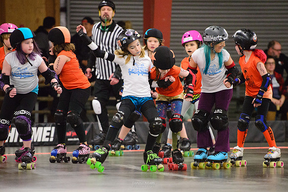 Turquoise Terrors vs. Orange Crush.