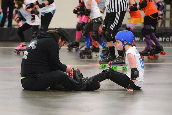 Turquoise Terrors vs. Orange Crush.