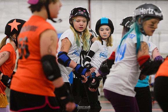 Turquoise Terrors vs. Orange Crush.