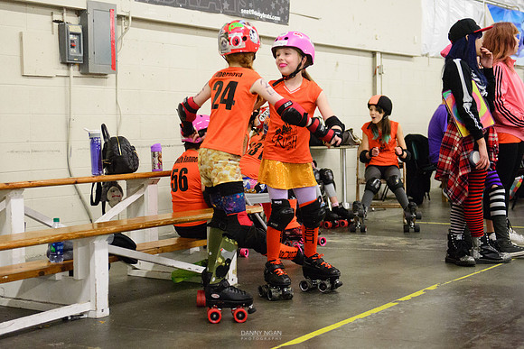 Turquoise Terrors vs. Orange Crush.