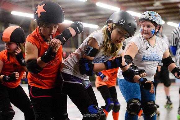 Turquoise Terrors vs. Orange Crush.