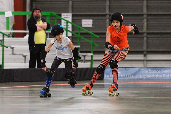 Turquoise Terrors vs. Orange Crush.