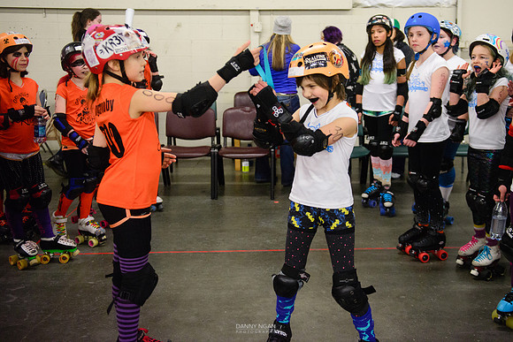 Turquoise Terrors vs. Orange Crush.