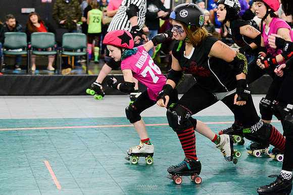 Evil Angels vs. Poison Skid'les.