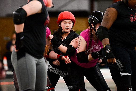 Evil Angels vs. Poison Skid'les.